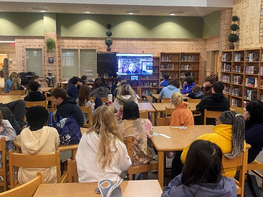 Students watching Marsha Skrypuch on the TV